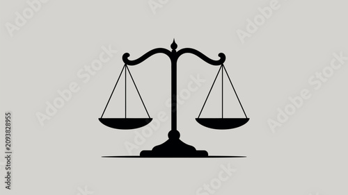 Silhouette of a classic balance scale symbolizing justice and law