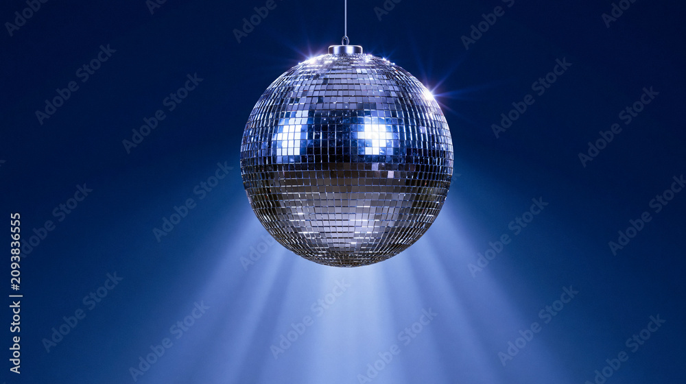 Obraz premium A dark blue discoball hangs, reflecting light onto a futuristic dusk background. This elegant bauble creates a premium party atmosphere with its shimmering surface.