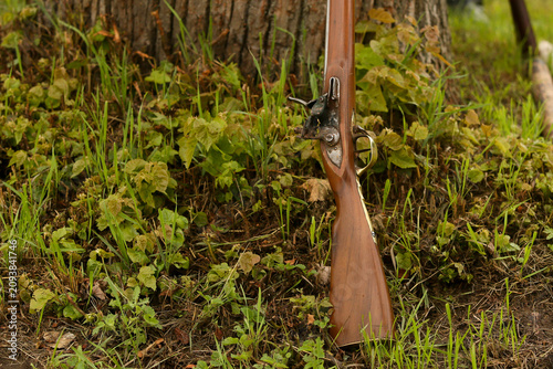 Canvas Print Replica 19th century rifle with a traditional wooden stock and metal barrel, rep