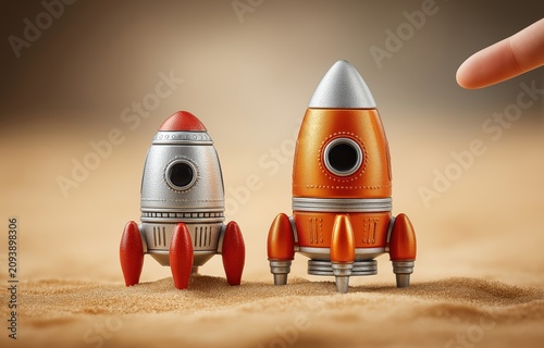 Child's hand reaches for a shiny moon lander near a red toy rocket half-buried in a sandbox in a backyard play area