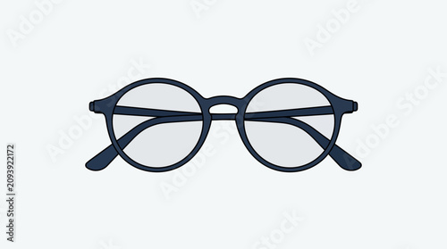 Obraz na plátně Eyeglasses with round frames are centered on a light background to suggest vision or intelligence