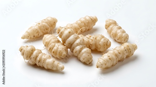 Freshly baked almond flour cookies on white background.