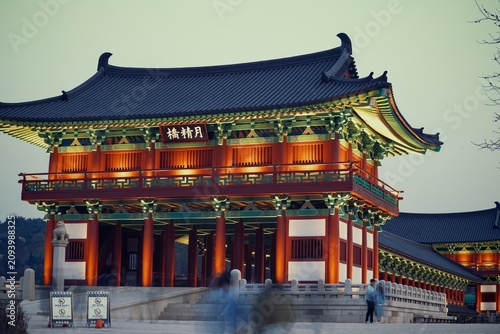 Tableau sur toile Front-side view of the illuminated Woljeonggyo Bridge gatehouse at dusk in Gyeongju
