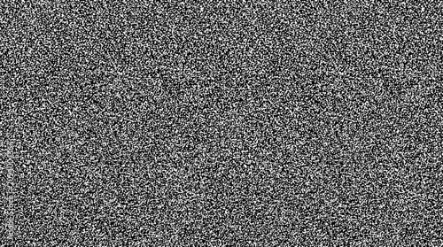 Canvastavla A close-up shot of a television screen displaying static noise, creating an abstract background texture with a grainy, pixelated effect
