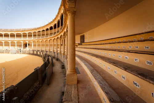 Bild auf Leinwand Closeup of  bench seating, safety ring at empty bullfight arena