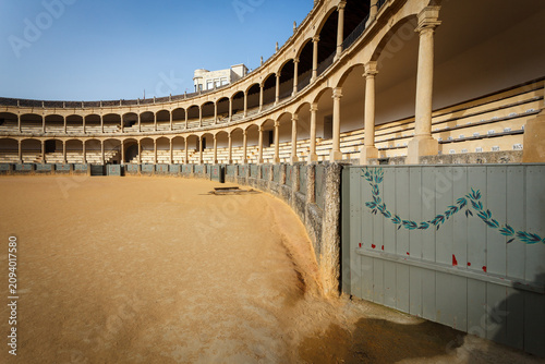 Foto Closeup of decorated entry door for bull into the ring for a bullfight in Ronda,