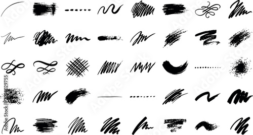 Collection of black ink brush strokes and scribbles for artistic design
