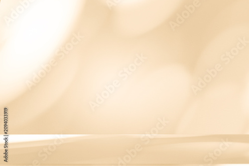Wall interior autumn background, studio, and backdrops show products. with shadow leaf color beige background for text insertion and presentation of product	