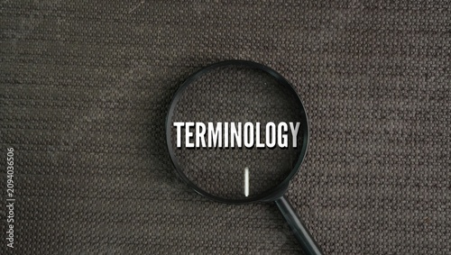 Photos magnifying glass with the word TERMINOLOGY