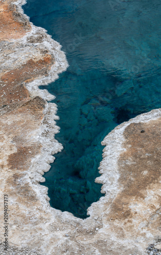 Turquoise Hot Spring Edge with Mineral Deposits