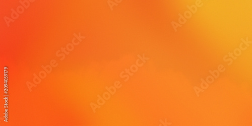 Abstract soft blurred orange gradient background with subtle textures.