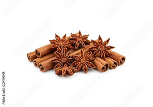 Star Anise and Cinnamon Sticks with Aromatic Spices Isolated on White Background