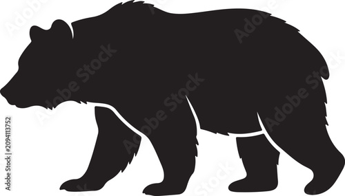 Fotografia Black silhouette of a grizzly bear walking