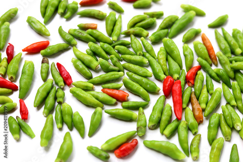 Tableau sur toile Fresh bird's eye chilies on white background.