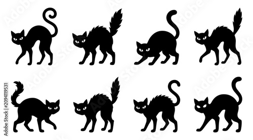 Photography Black cat silhouettes in various arched poses set against a plain white backgrou