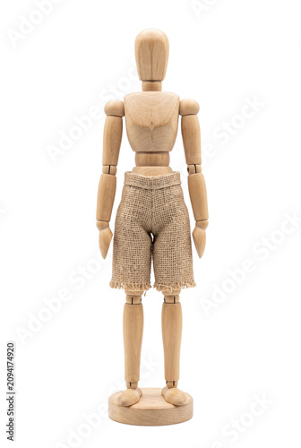 Obraz na płótnie Wooden mannequin standing wearing burlap shorts