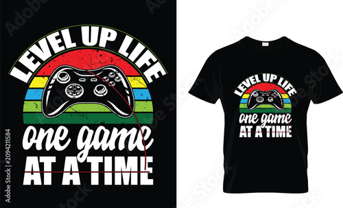 A vibrant retro gaming inspired t shirt design featuring a classic game controller and colorful sunset stripes, combined with motivational typography “Level Up Life One Game At A Time.” This artwork r