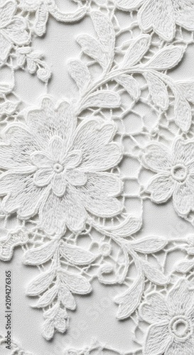 Elegant white cotton lace fabric featuring delicate floral patterns. A soft textile background highlighting fine craftsmanship and texture, white, lace, textile