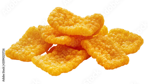 Photography Isolated delectable heap of vibrant golden orange savory snacks with a crispy textured surface