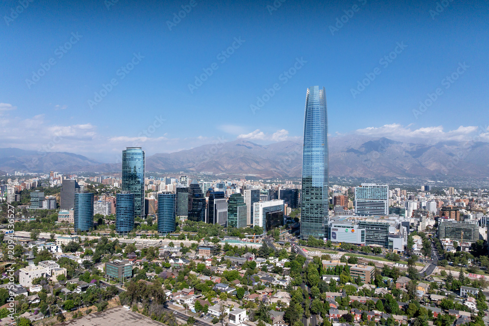 Obraz premium Aerial view of the Santiago skyline and Andean mountain scenery