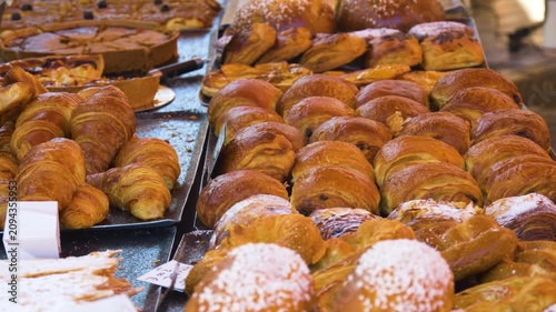 Sugar topped buns in bakery showcase