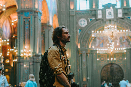 Photos Guy standing in the church Stock Photo