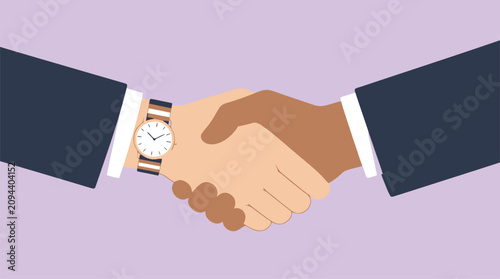 Two hands of different skin tones shaking in a business handshake