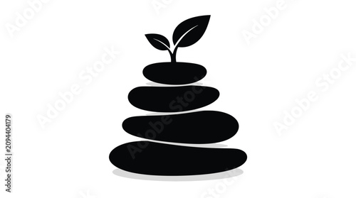 Stacked stones with sprouting plant growth
