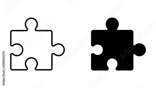 Konstfotografi Puzzle Piece Iconography: A graphic representation showing a white outline and a solid black silhouette of a puzzle piece, symbolizing connection, problem-solving, and completion