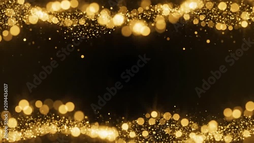 Golden bokeh lights framing dark background with sparkling particles