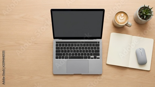 Minimalist Home Office Workspace with Laptop and Blank Screen Top View