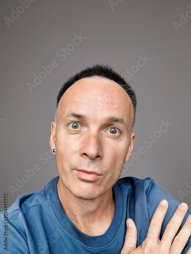 Studio Portrait of a Mature Man with Surprised Expression