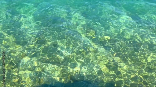 acqua chiara e pulita del lago d'orta, italia, clear and clean water of Lake Orta, Italy