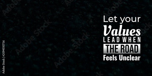 Photos Reflective quote about letting personal values guide the way when life feels uncertain, presented on a dark textured background with elegant typography