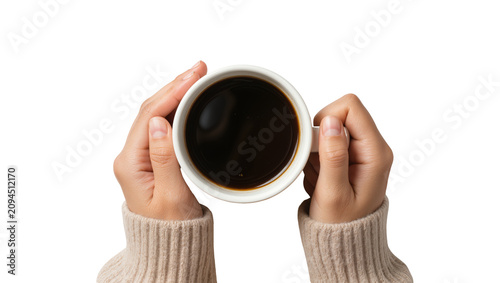 Obraz na płótnie Isolated hands in a cozy knitted sweater holding a white mug with hot black coff