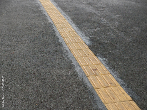 road marking on the sidewalk in the city