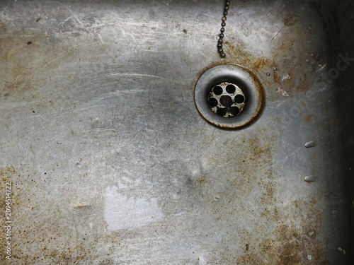 sink with dirty sink and tap in the bathroom