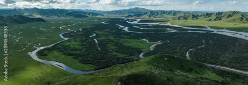 Epic Aerial Panorama of Yellow River Wetland: Mountain Ranges, Braided Water Systems and Winding Rivers in Zoige Grassland