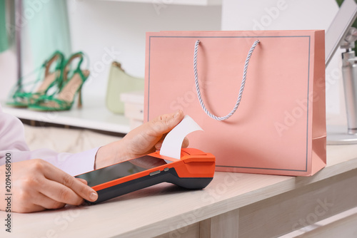 Customer receiving a paper ...