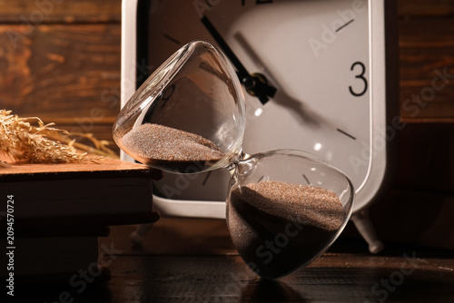 Hourglass with sand flowing...