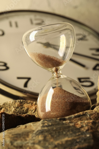 Hourglass with sand flowing...