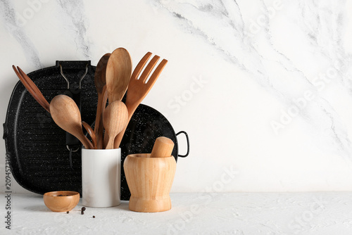 Wooden kitchen utensils in ...