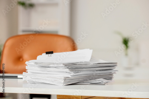 Stack of white papers with ...