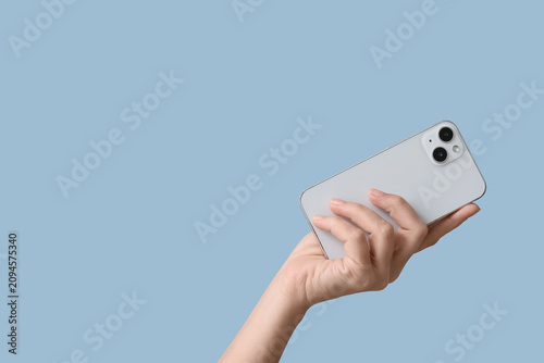 Female hand holding a moder...
