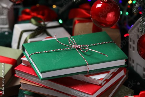 Books with Christmas ball a...