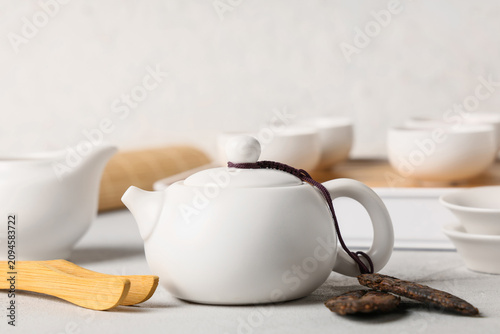 Teapot with brewed Asian te...