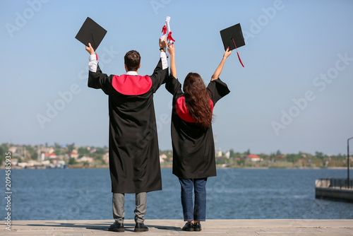 Couple of happy graduating ...