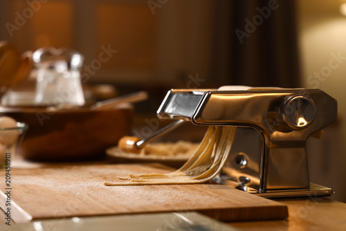 Pasta machine with dough on...