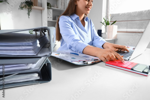 Female accountant working w...