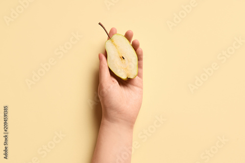 Female hand with half of sw...